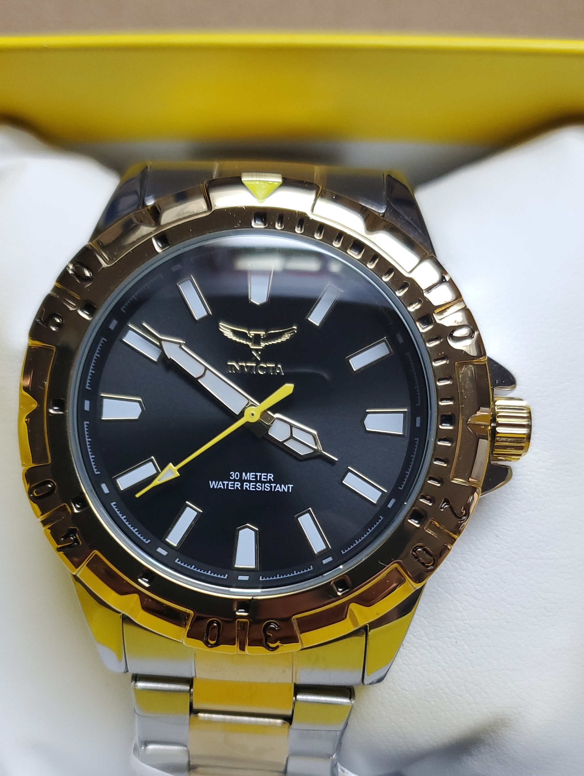 Invicta Gold  Silver Watch With Black Dial And Yellow Accents